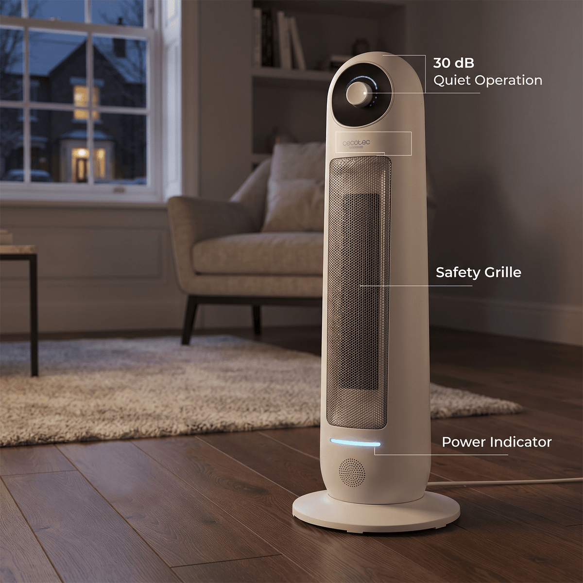 Upright ceramic tower heater in living room highlighting 30 dB quiet operation and safety grille.