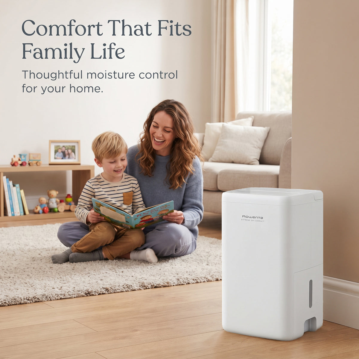 Portable 14L dehumidifier running quietly in family living room to provide healthy, damp-free home moisture control.