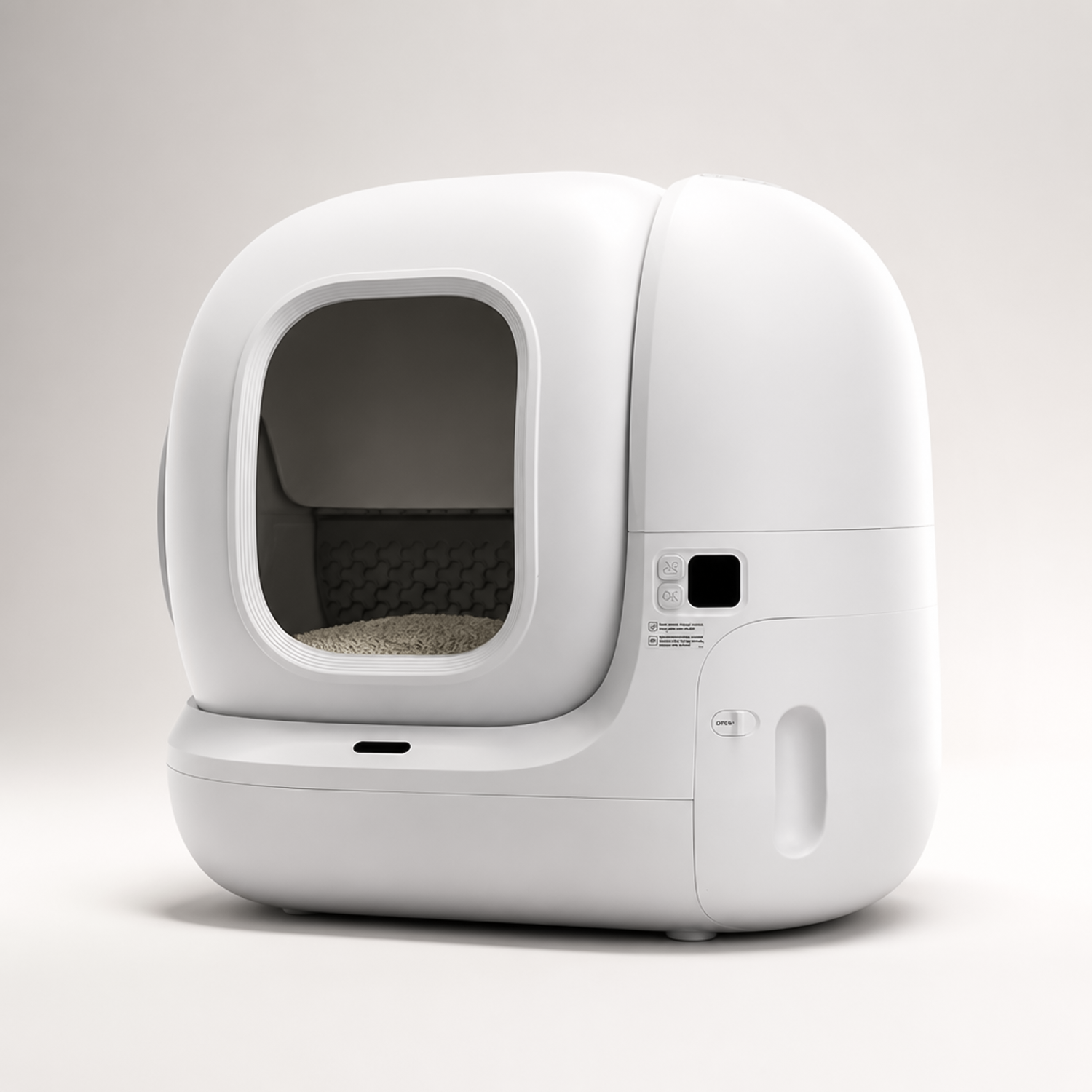 White automatic litter box for cat with low step entrance on neutral background.