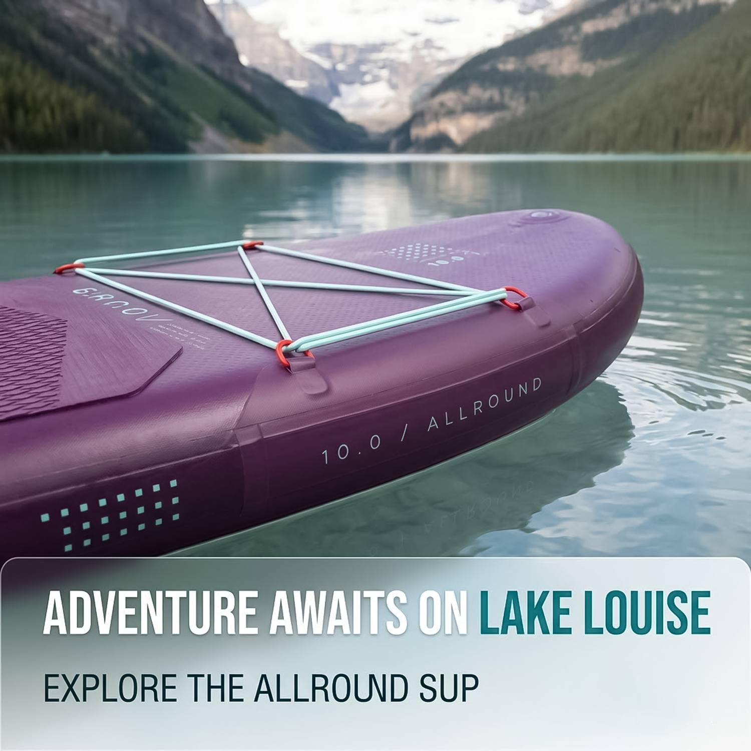 Front profile of purple all-round paddle board floating near a mountain lake