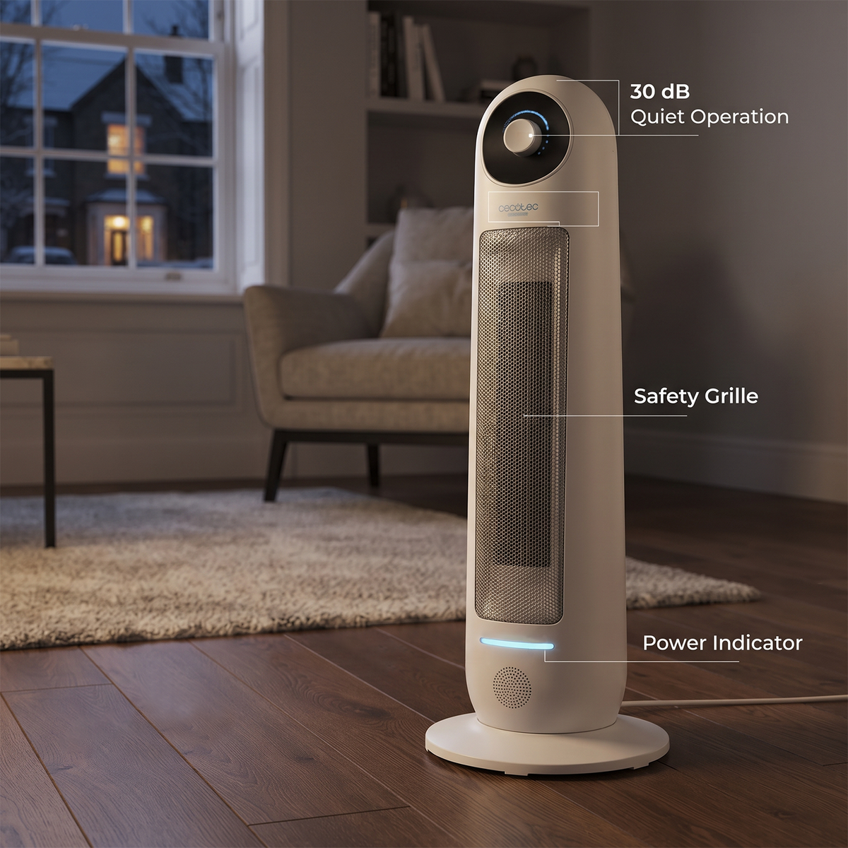 Upright ceramic tower heater in living room highlighting 30 dB quiet operation and safety grille. 