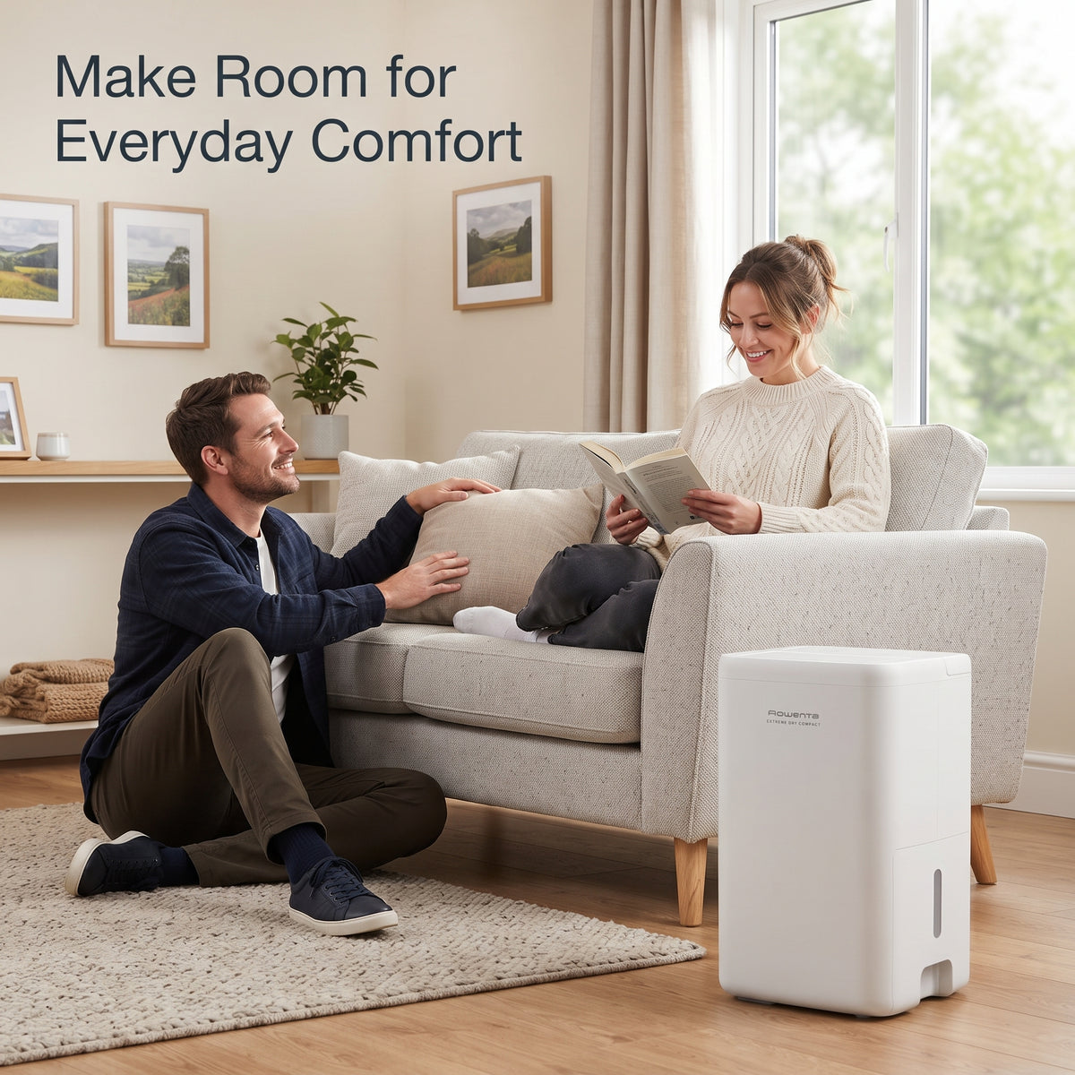 Compact 14L home dehumidifier placed beside living room sofa to reduce indoor humidity and keep air fresh.