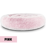 Round calming dog bed with raised rim