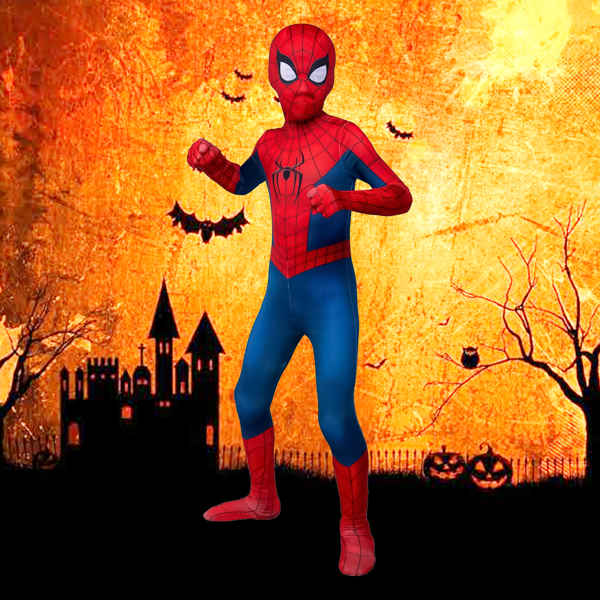 Full length view of child in kids spiderman costume against spooky Halloween backdrop.
