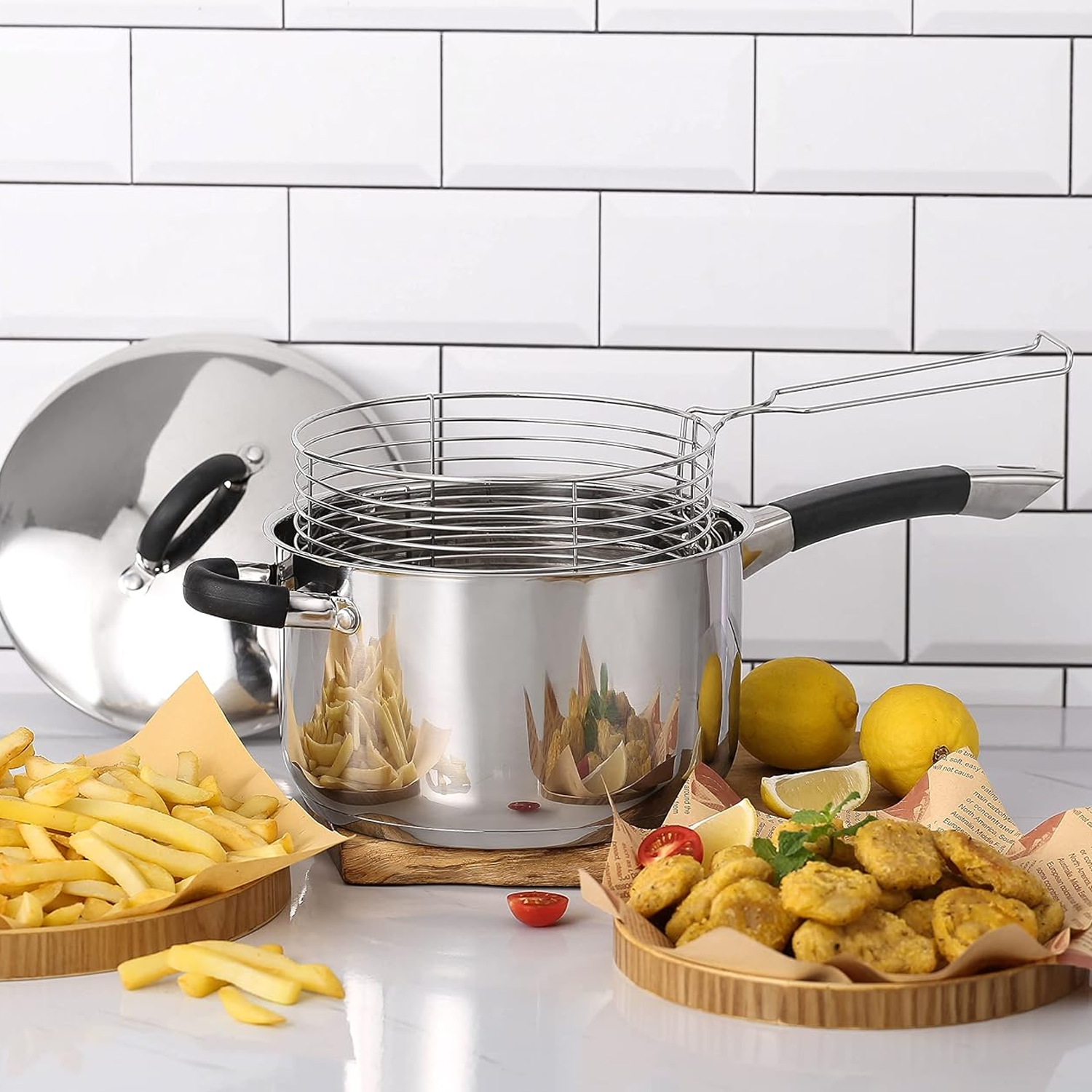 Stainless steel pot with black handles